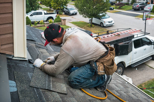 Professional Hail Damage Roof Repair technician working in Sebastian, FL